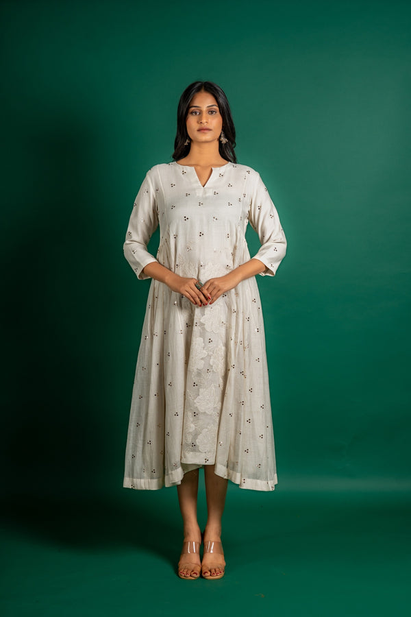 Off white Chanderi cotton panel frock with Mukesh work and centre panel patch work