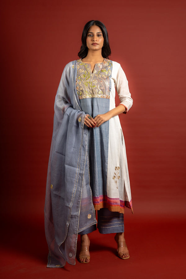 Grey and off white panel handloom top with Gota lace work on yoke in Daman zari pita work and grey Kota dupatta with work and cotton pant