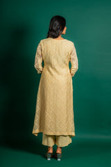 Light yellow Chanderi cotton A-line, all over thread work, little sequin work and organza dupatta with rayon pant