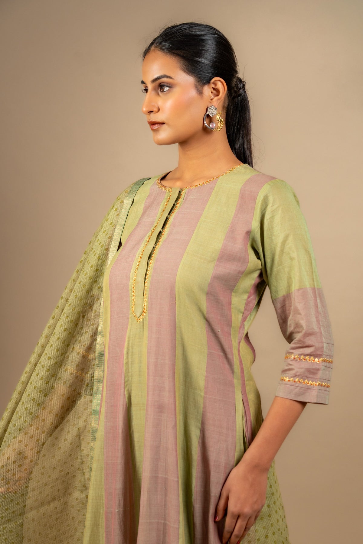 Pink and green Kali handloom top, shikargah appliqué work on the Daman, zari work near the neckline. Kota dupatta with print and cotton pant