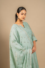 Mint green Chanderi A-line top with Chikankari with Mukesh work, same shade Chanderi dupatta with Mukesh work and rayon pant