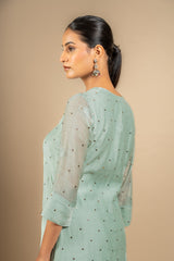 Mint green Chanderi A-line top with Chikankari with Mukesh work, same shade Chanderi dupatta with Mukesh work and rayon pant