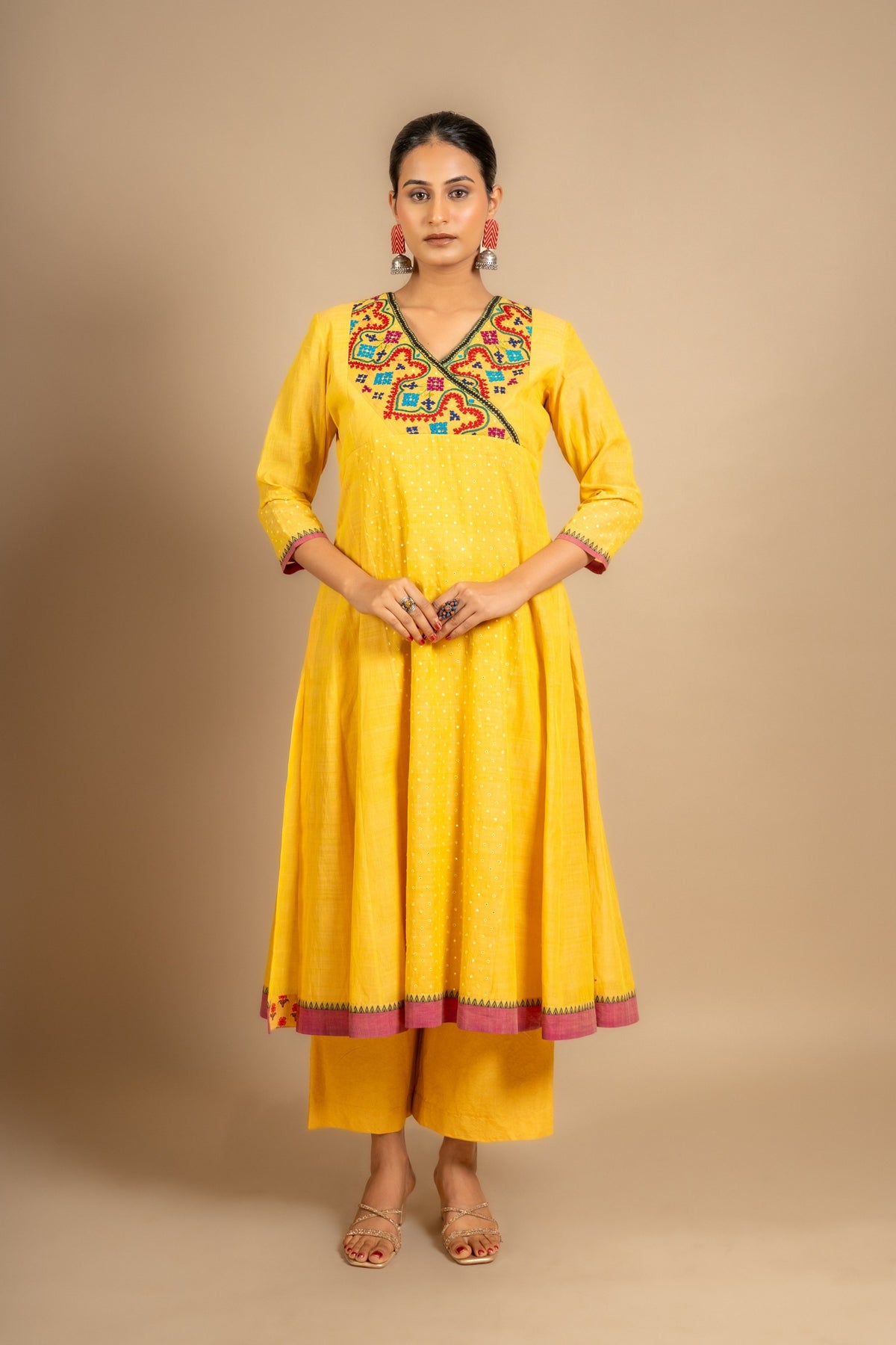 Yellow handloom Kali top with Kutch work overlap on yoke and front panel, tiny mirror work with cotton pant