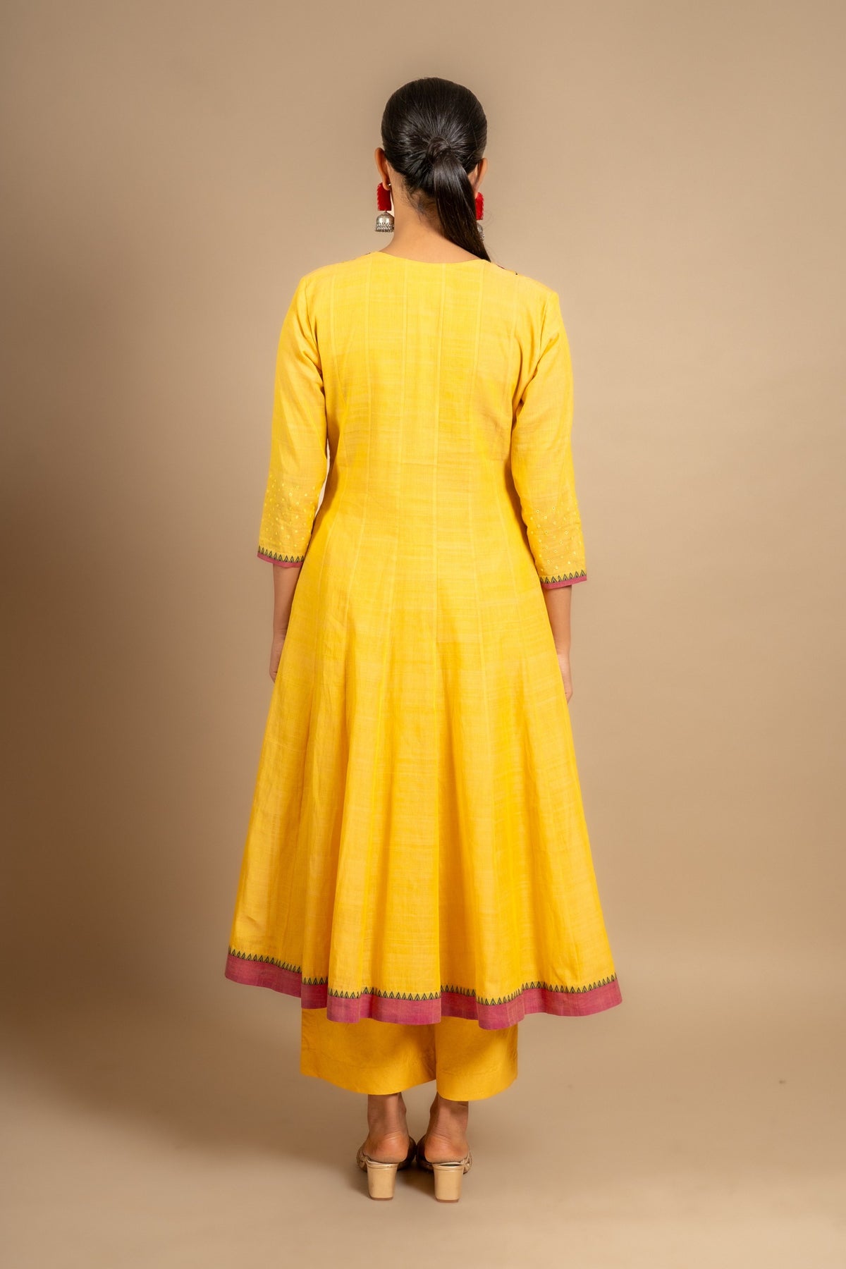 Yellow handloom Kali top with Kutch work overlap on yoke and front panel, tiny mirror work with cotton pant