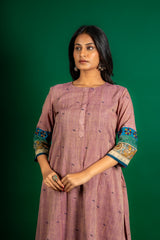 Onion shade panel top with detailing with kalamkari and thread work with nice blue chekes dupatta with patch work and cotton pant