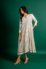Off white Chanderi cotton panel frock with Mukesh work and centre panel patch work