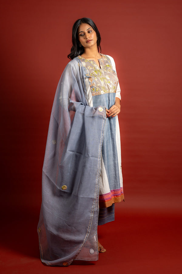Grey and off white panel handloom top with Gota lace work on yoke in Daman zari pita work and grey Kota dupatta with work and cotton pant
