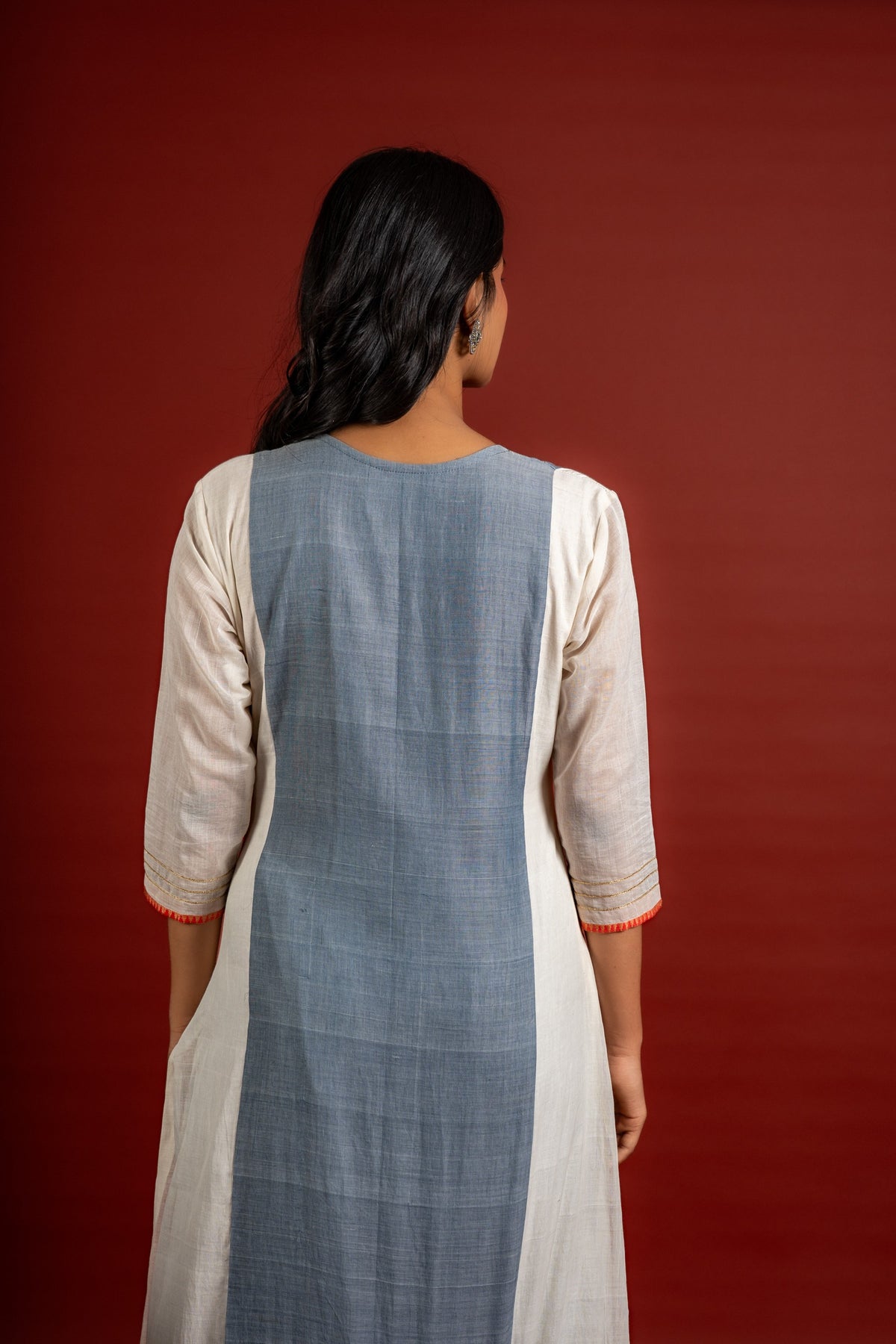 Grey and off white panel handloom top with Gota lace work on yoke in Daman zari pita work and grey Kota dupatta with work and cotton pant