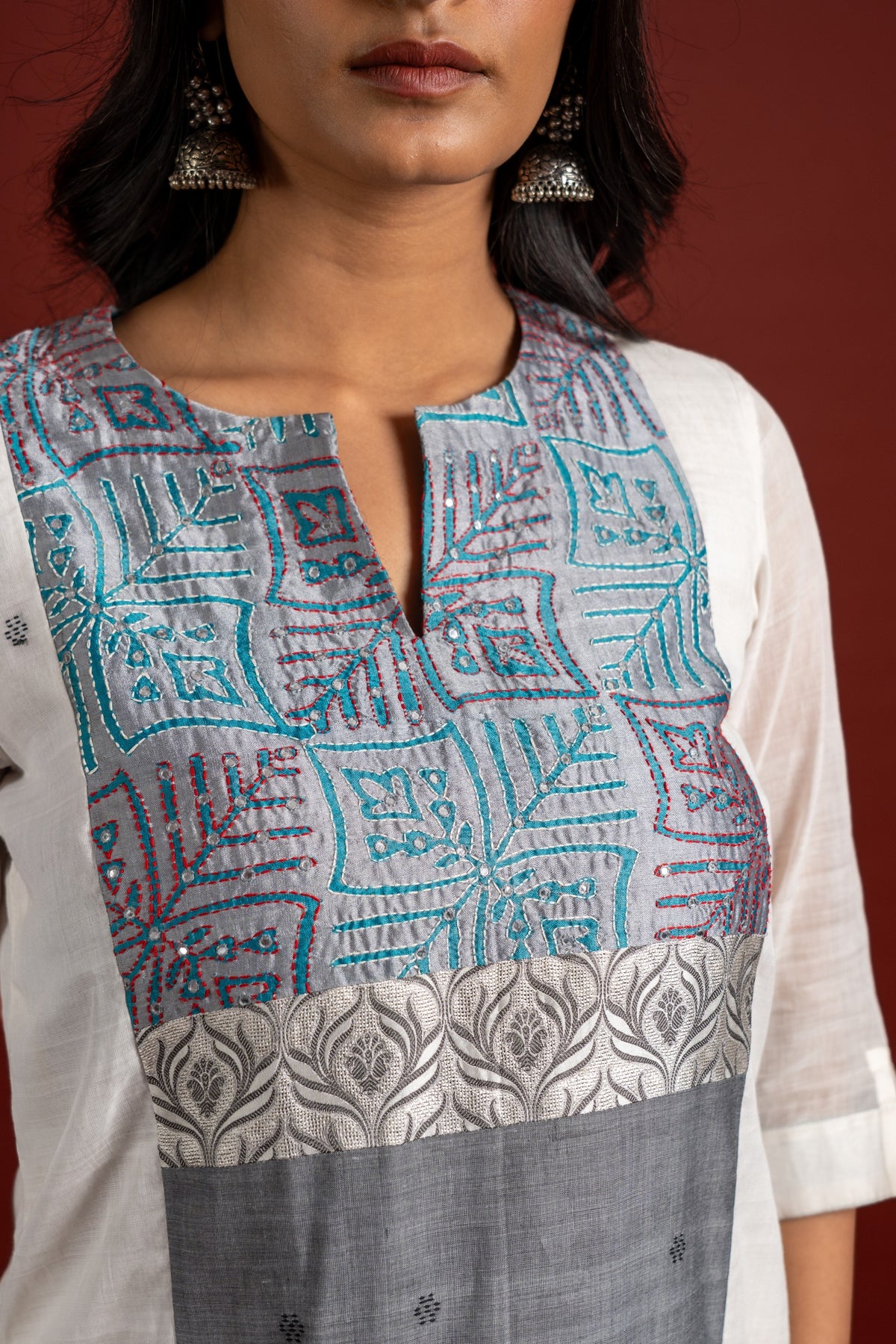 Off white and grey panel handloom top, kanta work on yoke with grey Kota dupatta with mirror work, tie and dye pant