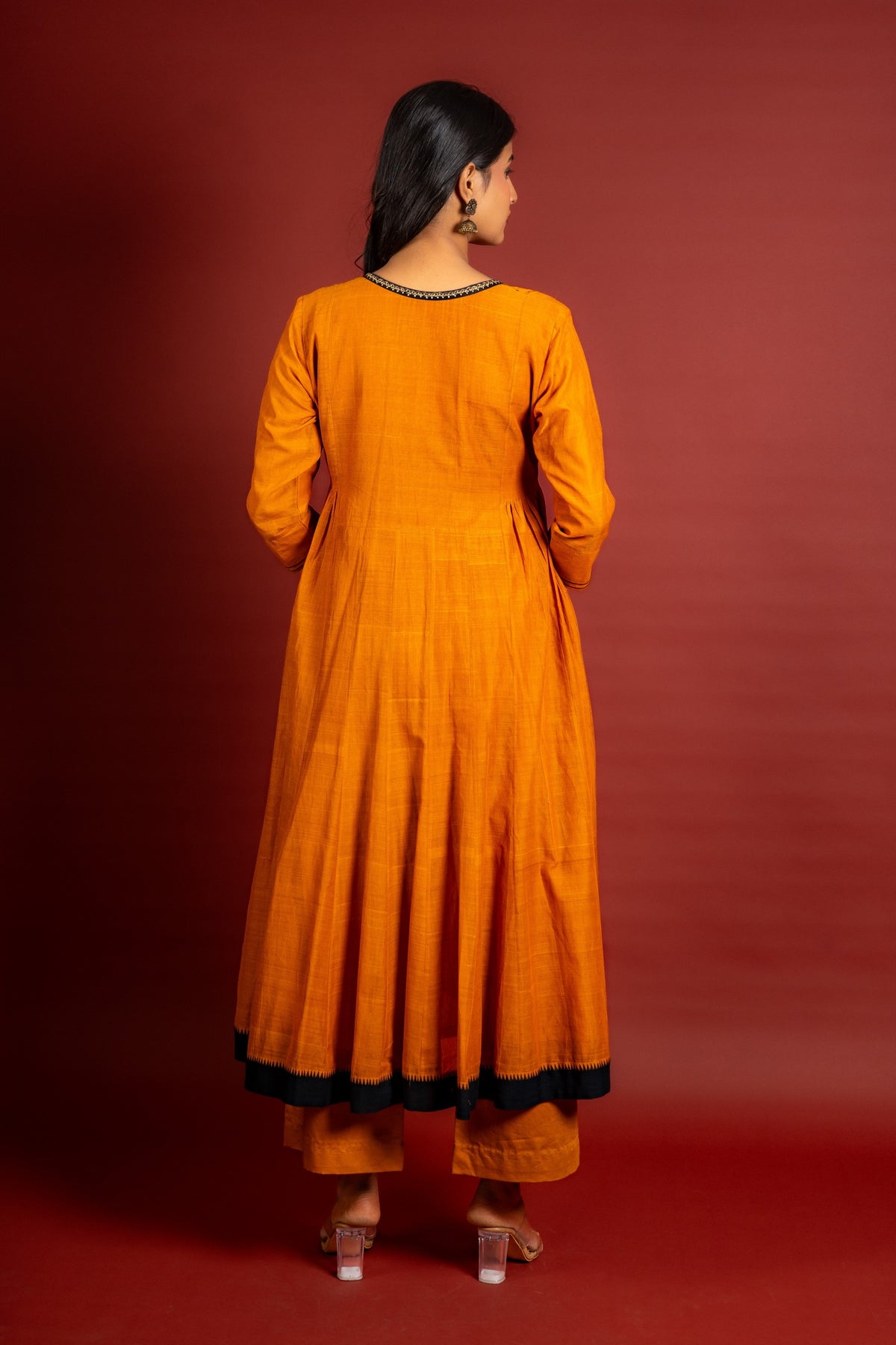 Saffron shade handloom Kali top with kalamkari with tiny mirror work, delicate zari work on neck with Maheshwari dupatta and pant