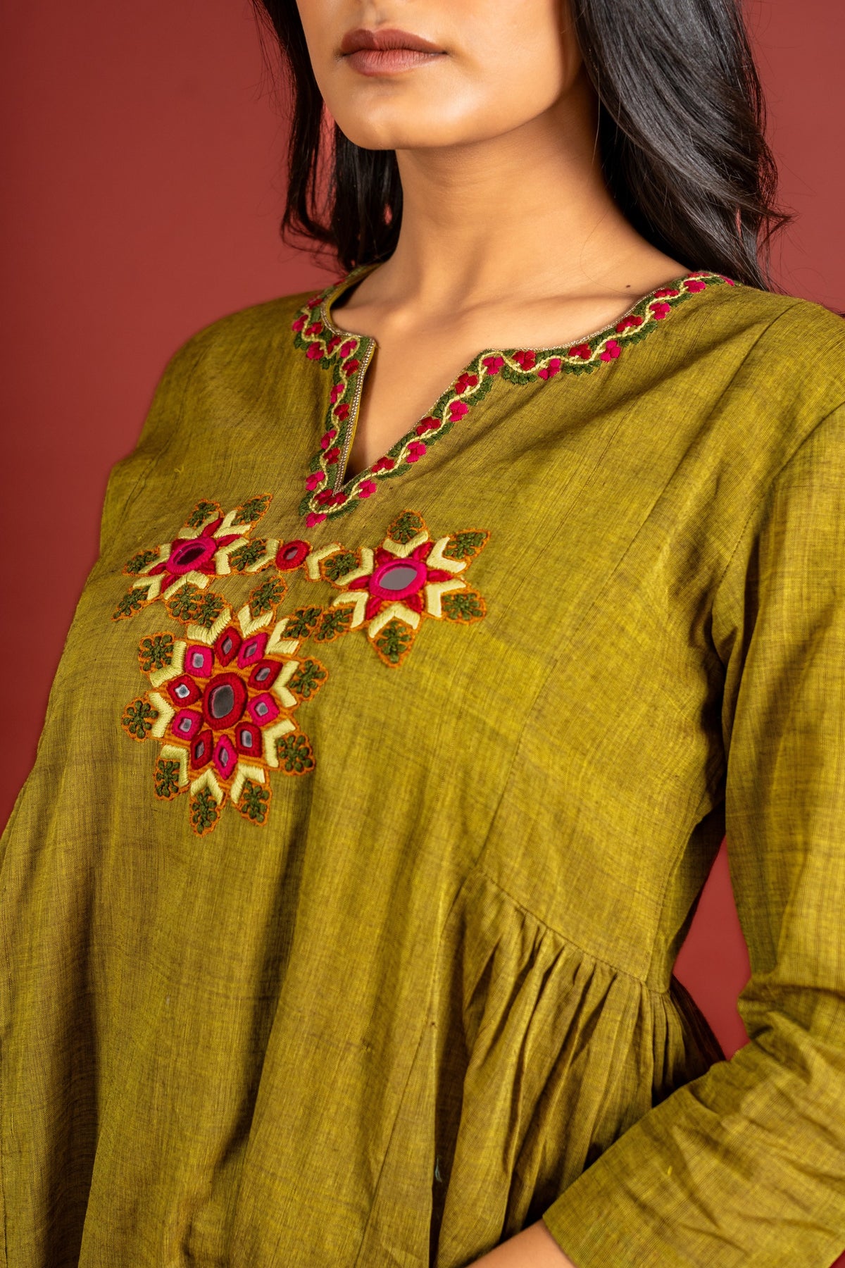 Mehendi green handloom panel with side gather top with thread and mirror work on neck with cotton tie and dye pant