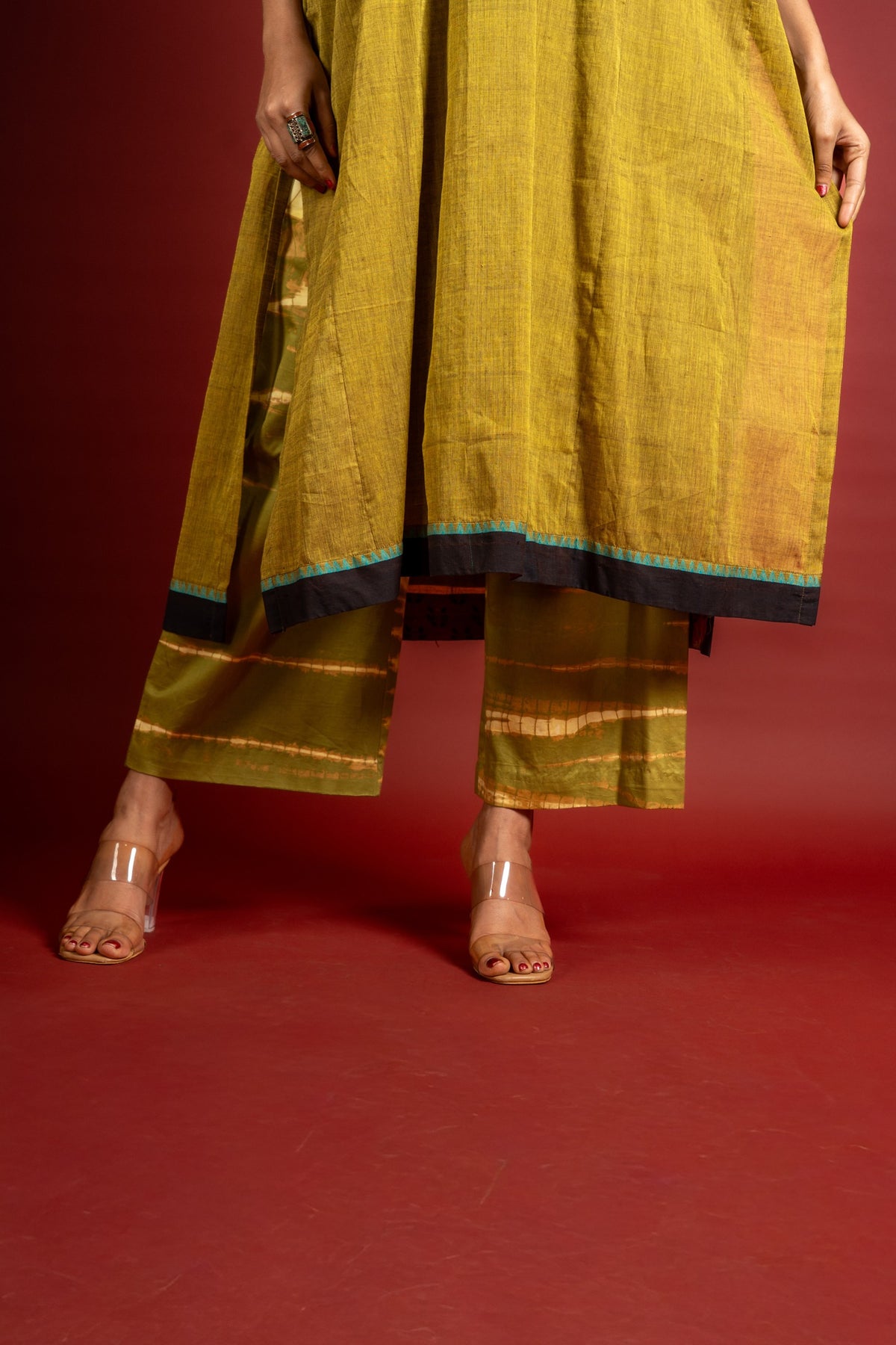 Mehendi green handloom panel with side gather top with thread and mirror work on neck with cotton tie and dye pant
