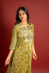 Light green Chanderi printed panel top with sequin work on yoke, organza dupatta with sequin work and rayon pant