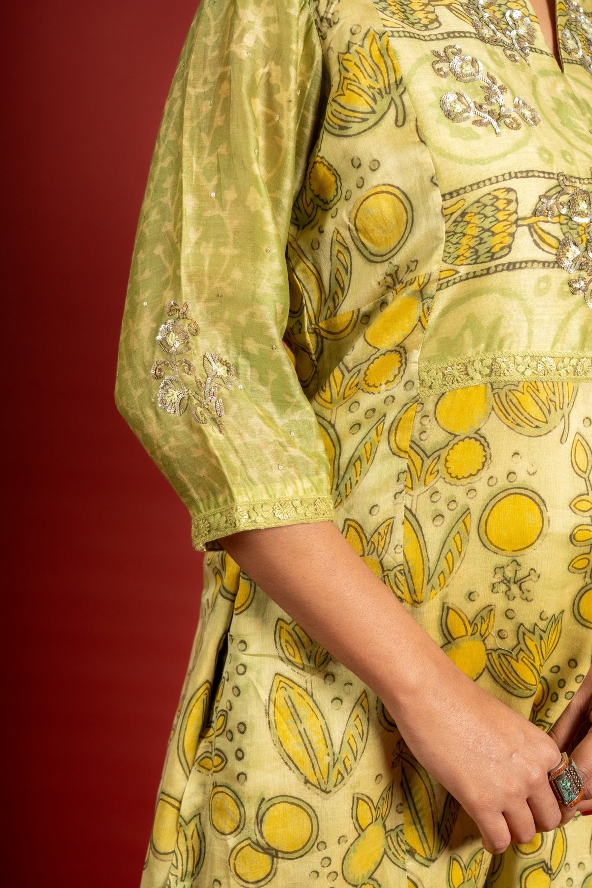 Light green Chanderi printed panel top with sequin work on yoke, organza dupatta with sequin work and rayon pant