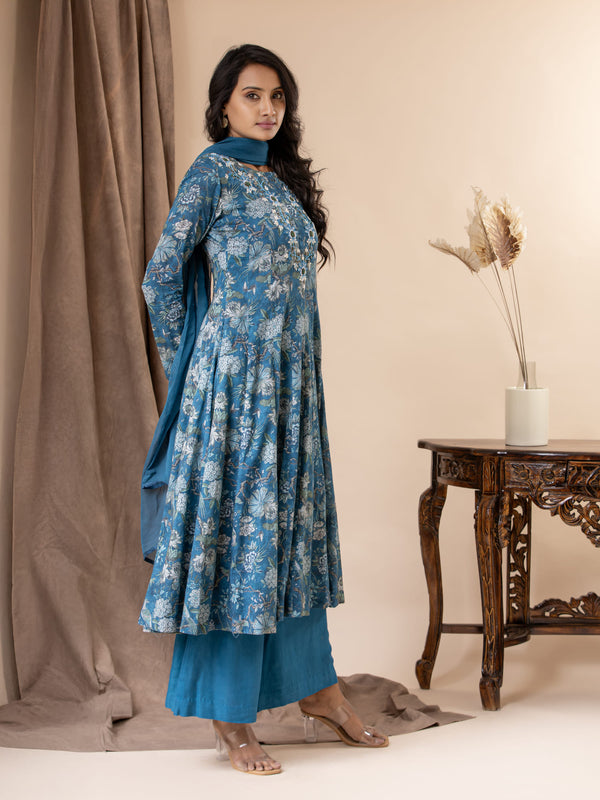 Blue floral printed kali top in muslin with intricate hand embroidery detailing, paired with a dupatta and pants