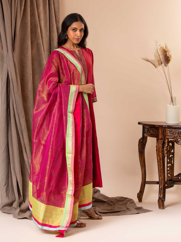 Chanderi kali top in cherry red paired with a tissue-printed Kota dupatta and lycra pants