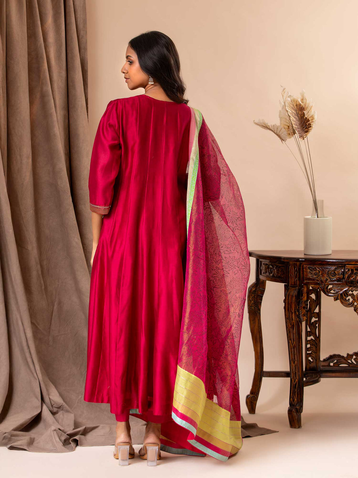 Chanderi kali top in cherry red paired with a tissue-printed Kota dupatta and lycra pants