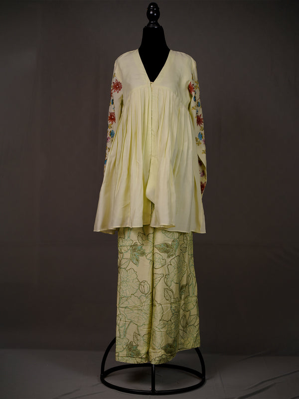 Cream Muslin Silk Pleated Top With Work On Sleeves, Printed Pants