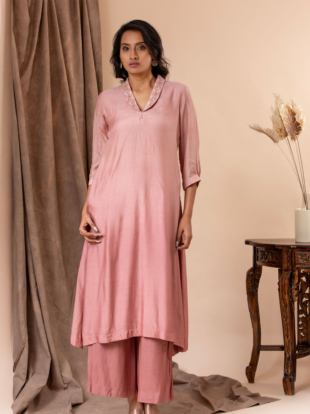 Dusky rose ombre shaded muslin straight-cut top with intricate handwork floral collar detailing, paired with matching pants.