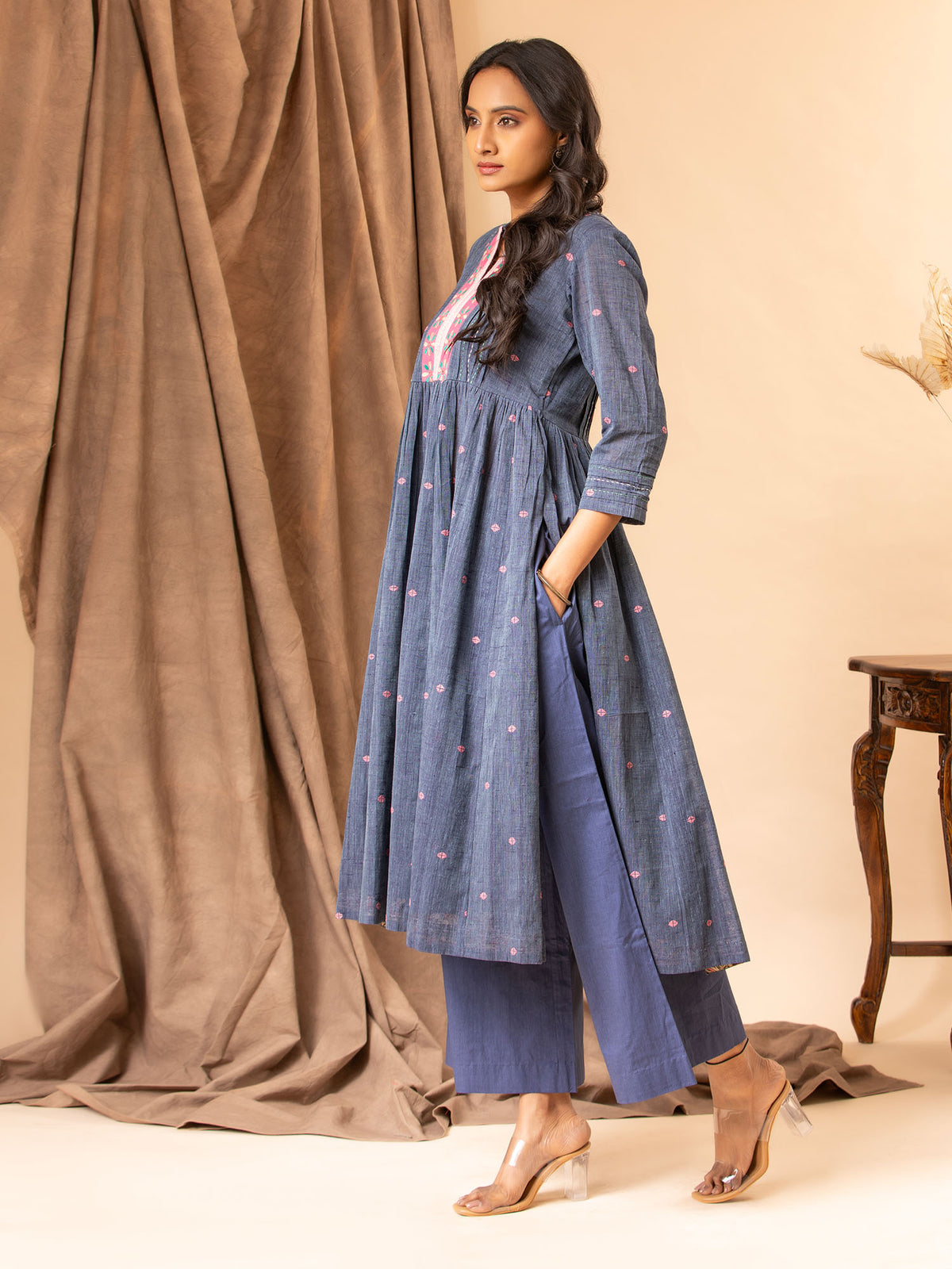 Handwoven muted blue kali top with a gathered design, featuring Kutch work detailing and Kantha anchor work lines