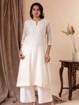 Ivory thread work Chanderi top with a Chanderi dupatta featuring all-over embroidery, paired with pants