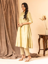 Muted sage handwoven gathered top with zari and silver bhuti, mirror and zari work detailing, paired with self-coloured pants