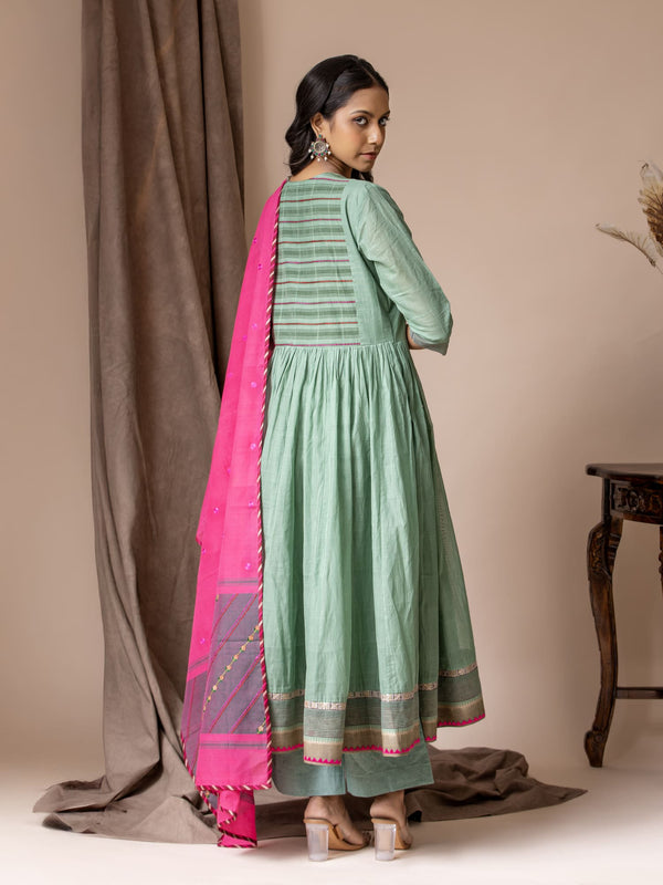Muted teal handwoven top paired with a pink handwoven dupatta featuring thread work detailing, and matching pants
