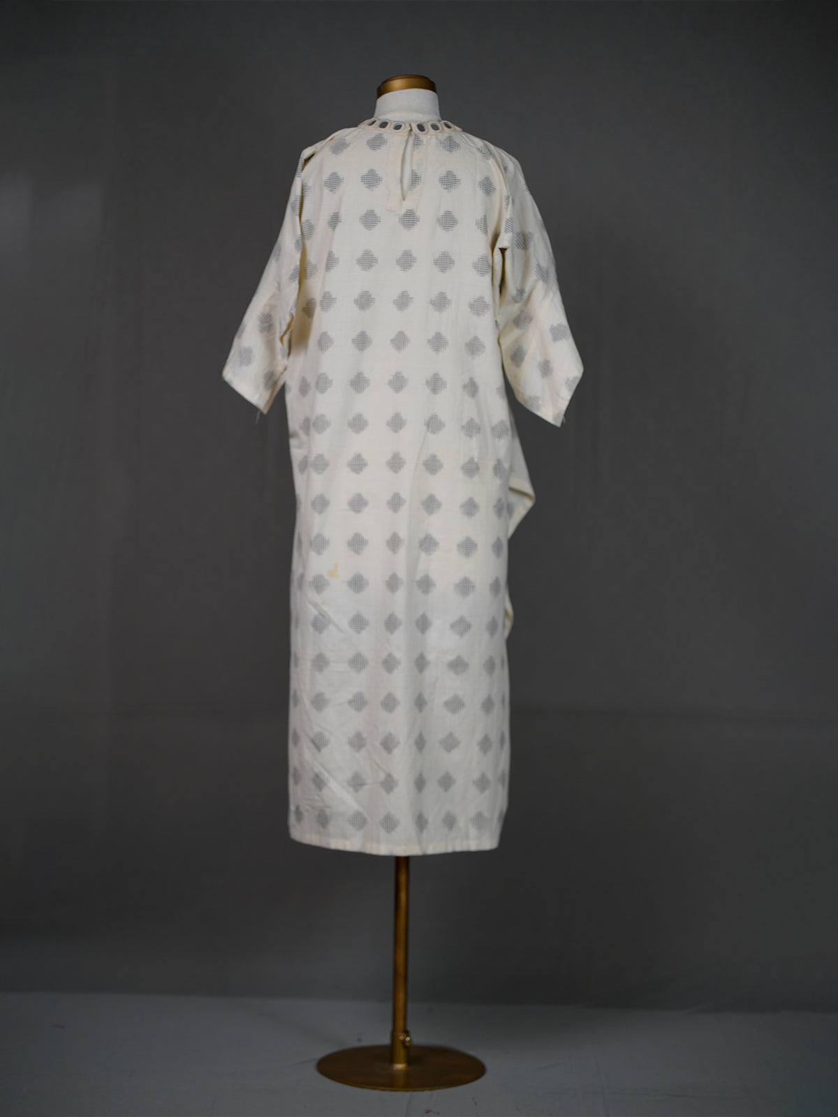 Off White Ikkat Kurti with High Closed Neck and Chunky Mirrors