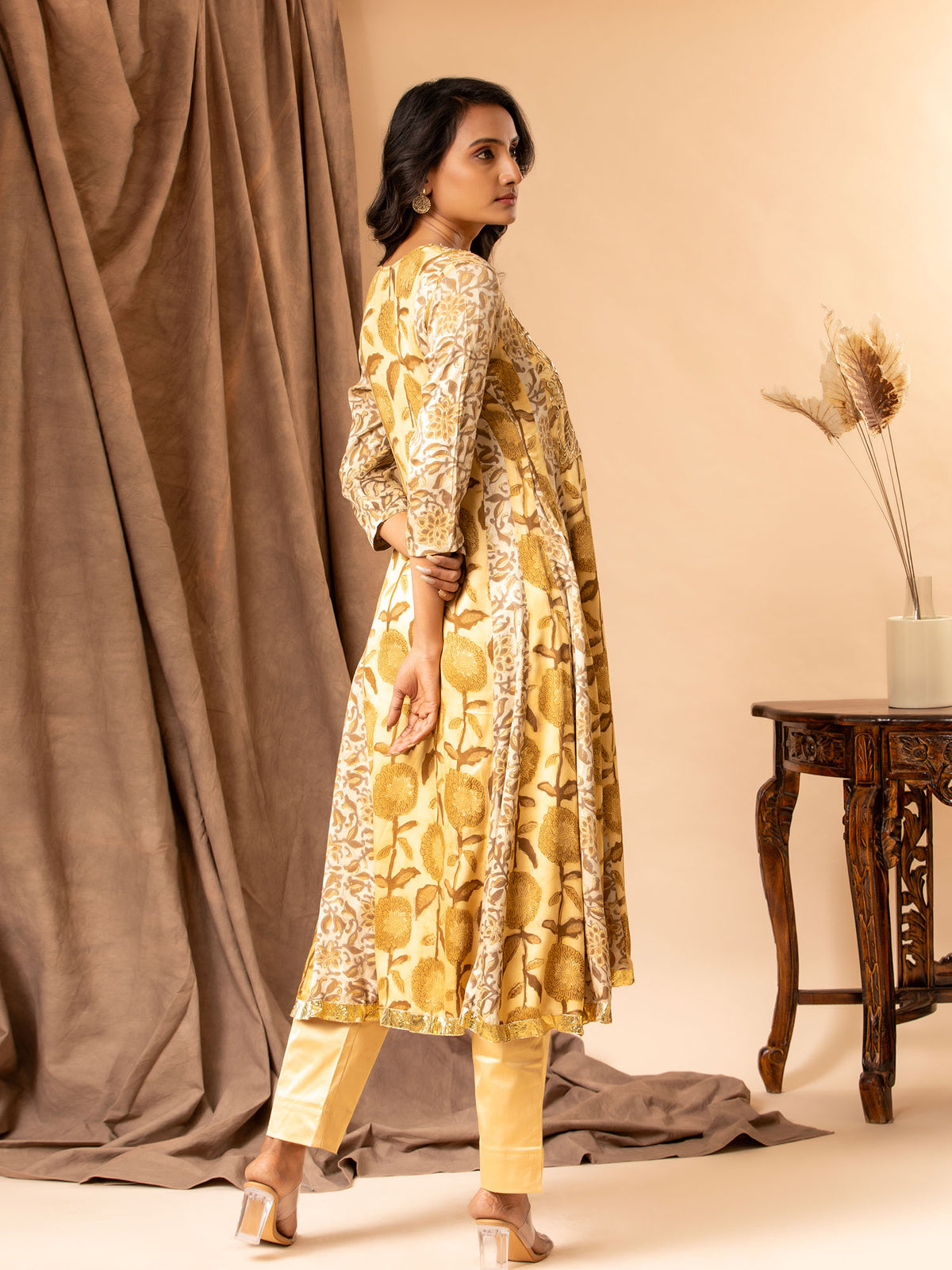 Printed Mushroo panel top with sequin work on the yoke, paired with straight pants