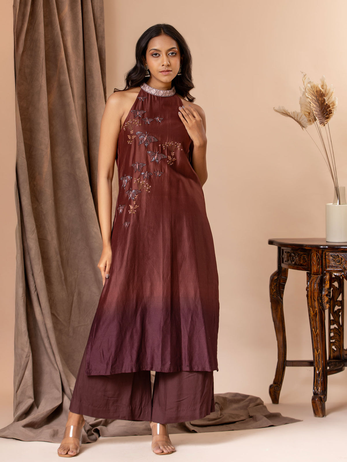 Shaded brown Chanderi halter neck straight-cut top with butterfly hand embroidery detailing, paired with pants.