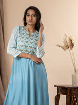 Shaded sky to light blue muslin top with Gota Patti work, cutdana detailing, and thread work hand embroidery, paired with pants