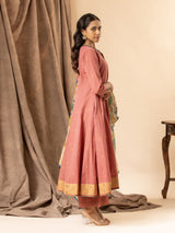 Warm terracotta handwoven top with mirror work on the neckline, paired with a Kalamkari dupatta and matching pants