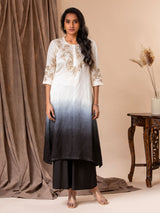 White to black ombre-shaded linen satin straight-cut top with detailed Gota hand embroidery, paired with black pants.