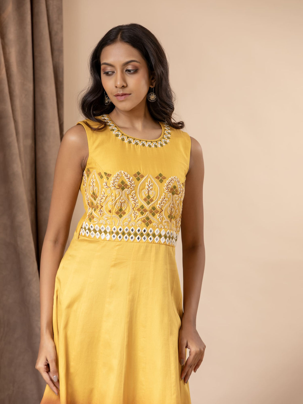Yellow to brown ombre shaded kali frock with thread and mirror handwork detailing