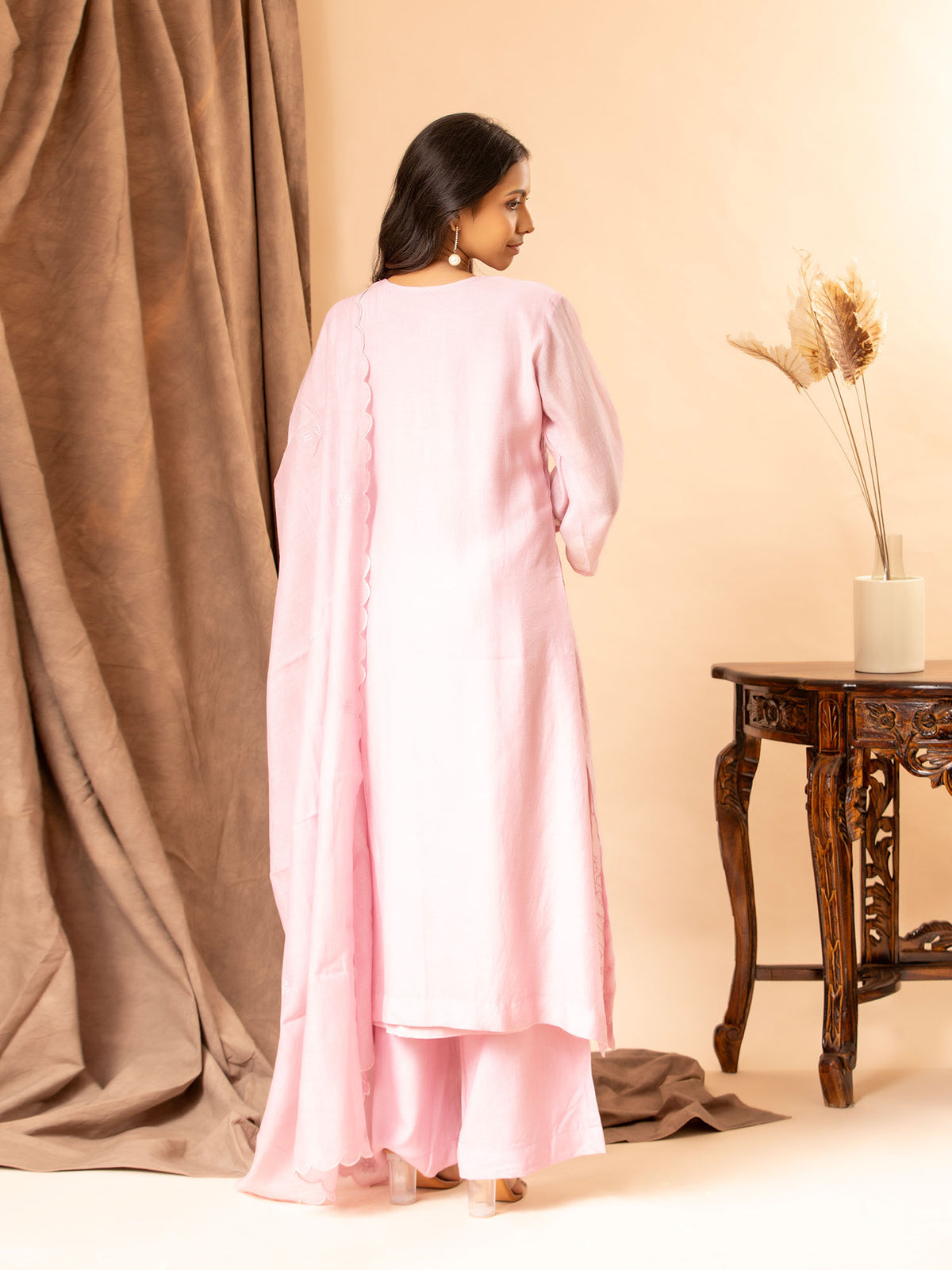 Soft baby pink cotton Chanderi top with all-over thread work, highlighted with sequins, paired with a dupatta featuring thread butti