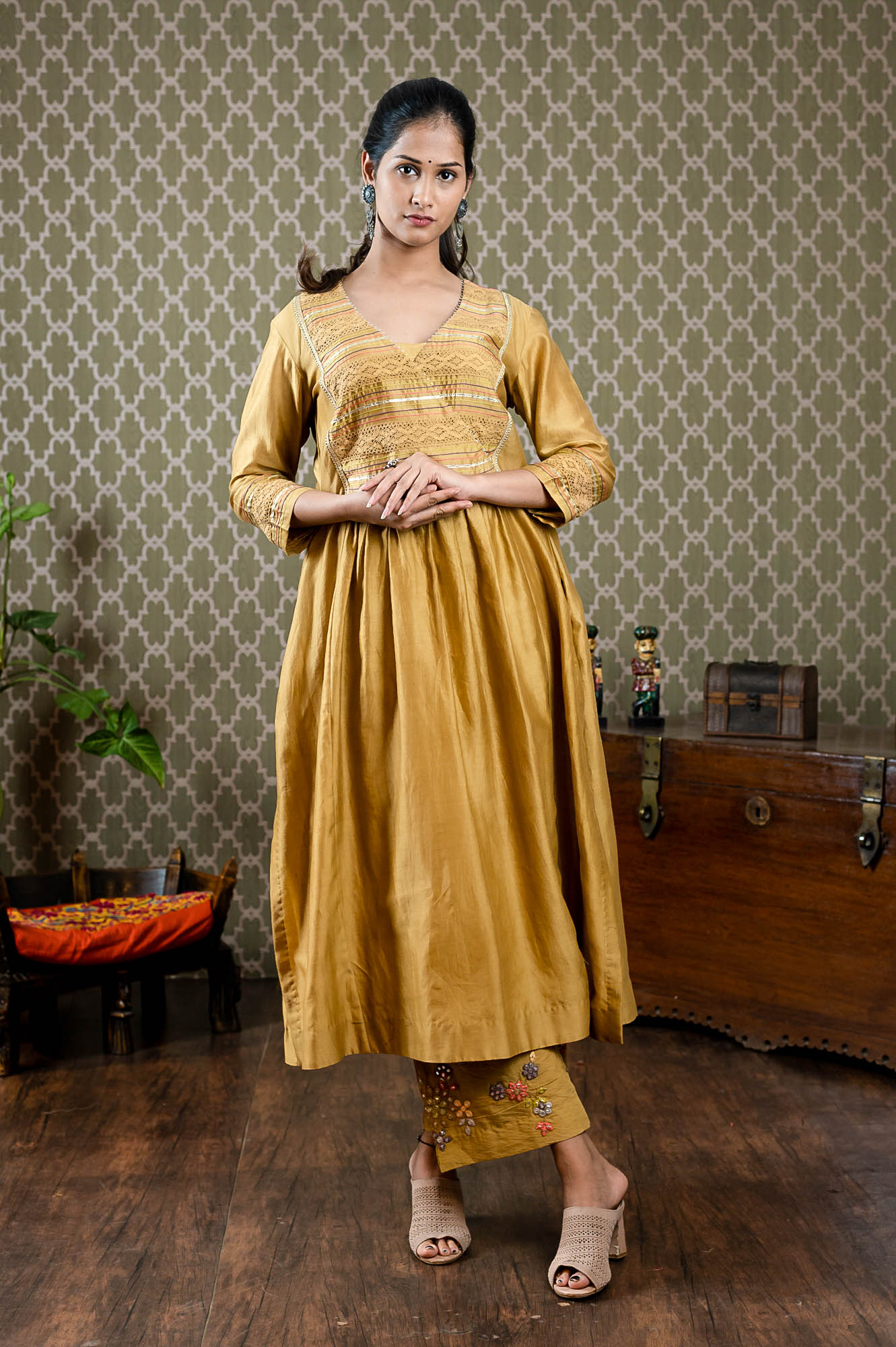Chanderi too with overlap pattern with pintucks and lace paired up with embroidered st cut pants
