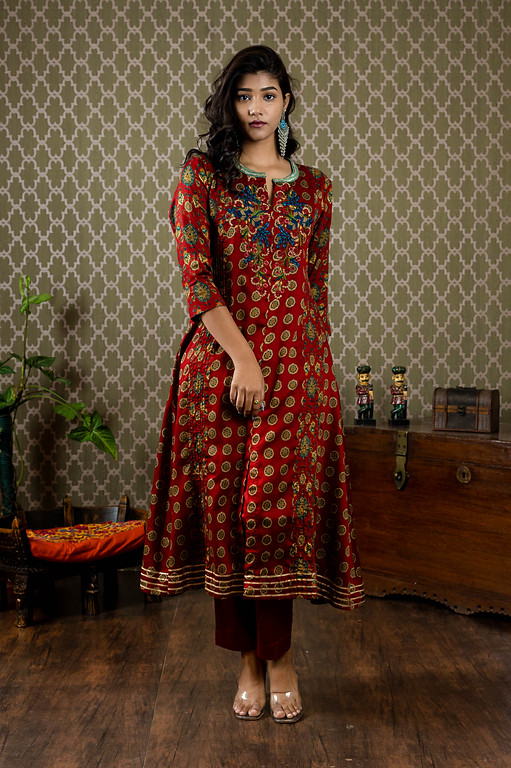 Pure cotton Satish finish printed top with sequin and thread embroidery paired up with stretchable plain pants