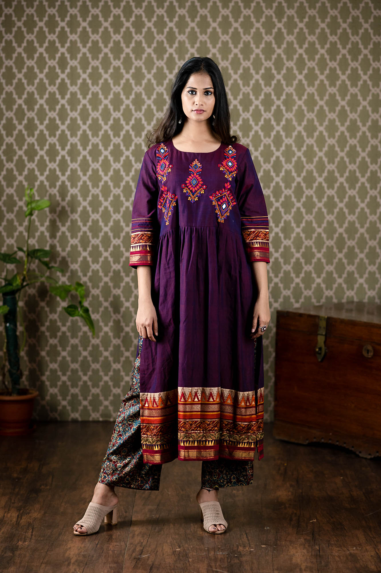 Handwoven cotton top with thread and mirror embroidery with zari borders paired up with ajrakh printed pants
