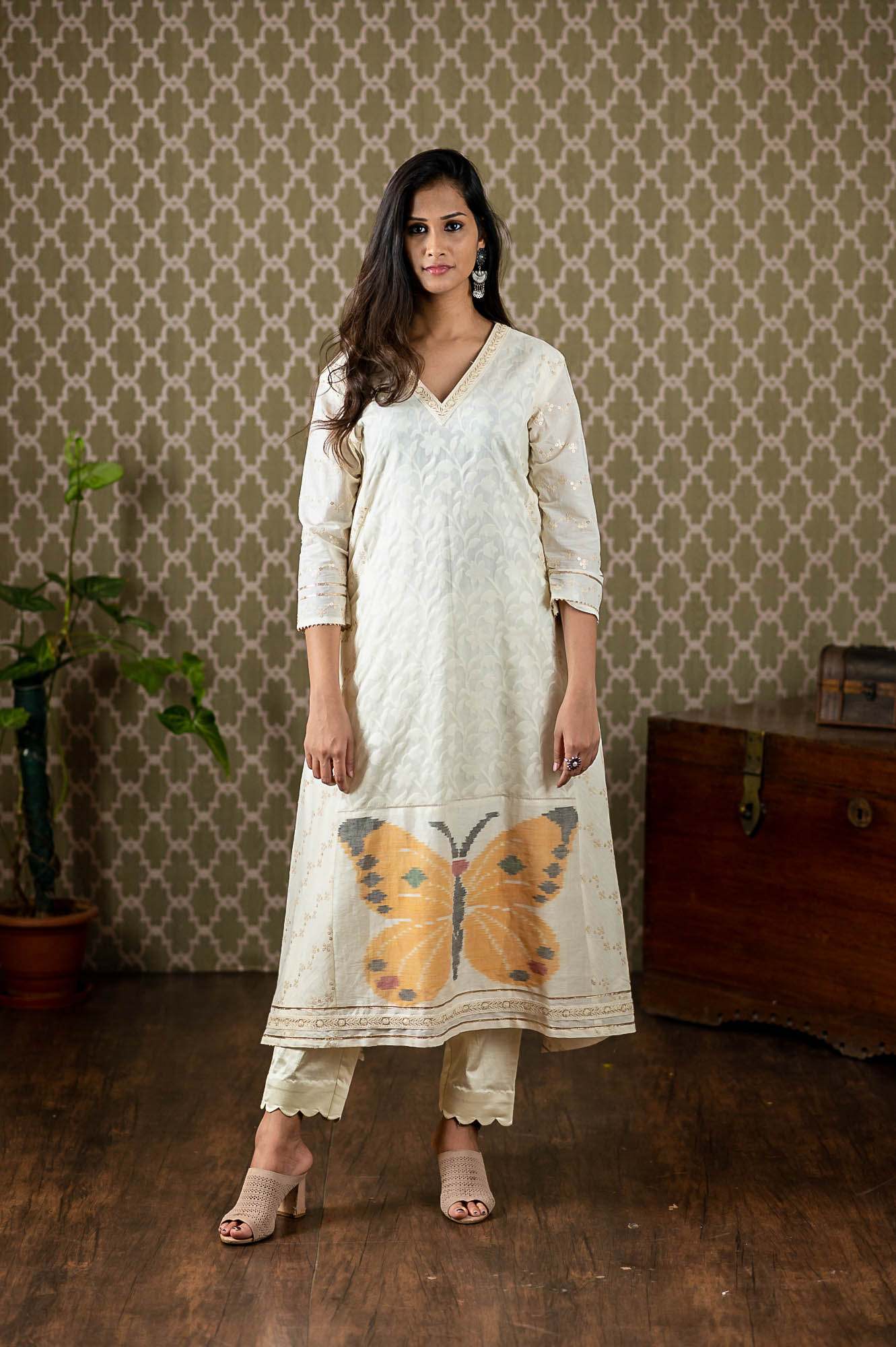 Handwoven banarasi cotton dress with Ikat patchwork with sequin all over paired up with stretchable pants